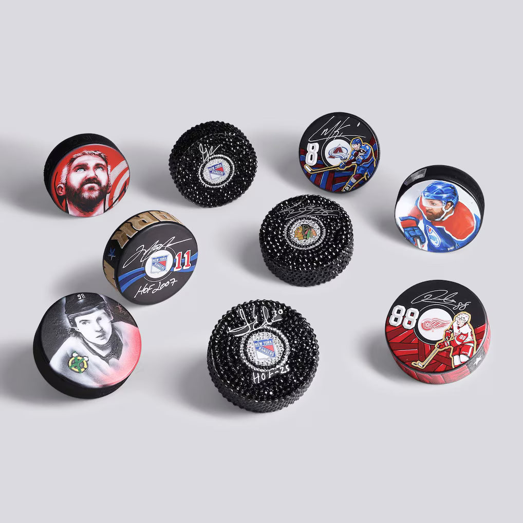 NHL UNDER WRAPS MYSTERY SIGNED PUCK